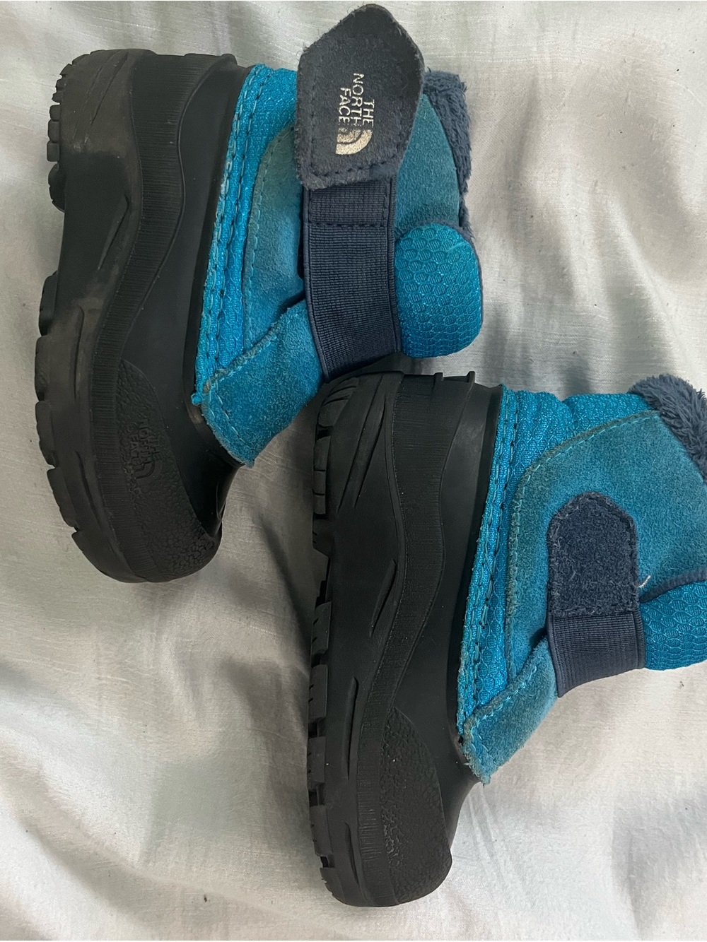 The North Face Kids Blue Teal Snow Boots with Black Outsole